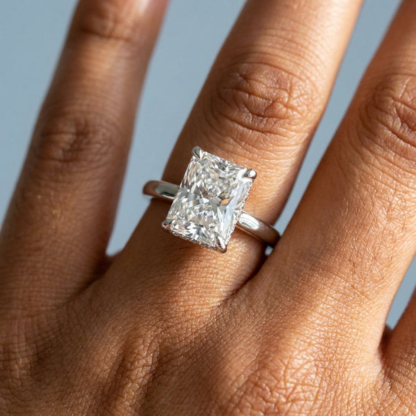 Hand model shot of the white gold engagement ring
