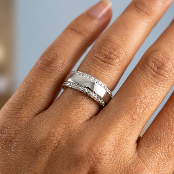Hand model shot of the white gold Single French Cut Pave diamond wedding band
