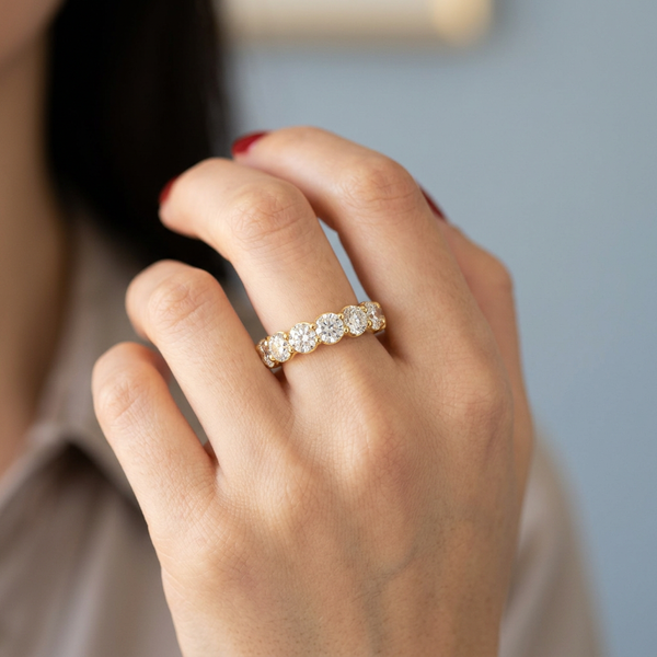 Hand model shot of the yellow gold engagement ring