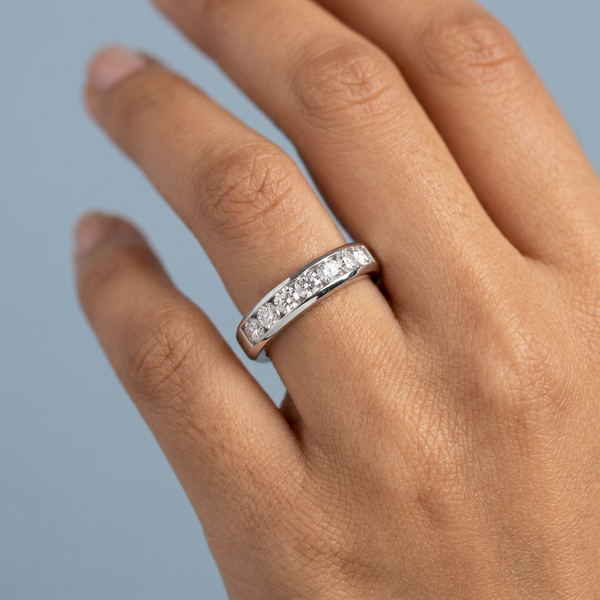 Hand model shot of the white gold diamond wedding band