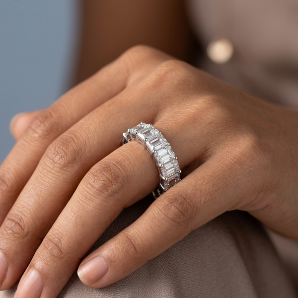 Hand model shot of the white gold Single French Cut Pave diamond wedding band