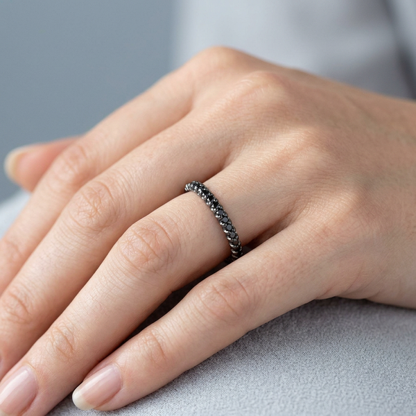 Hand model shot of the white gold diamond wedding band