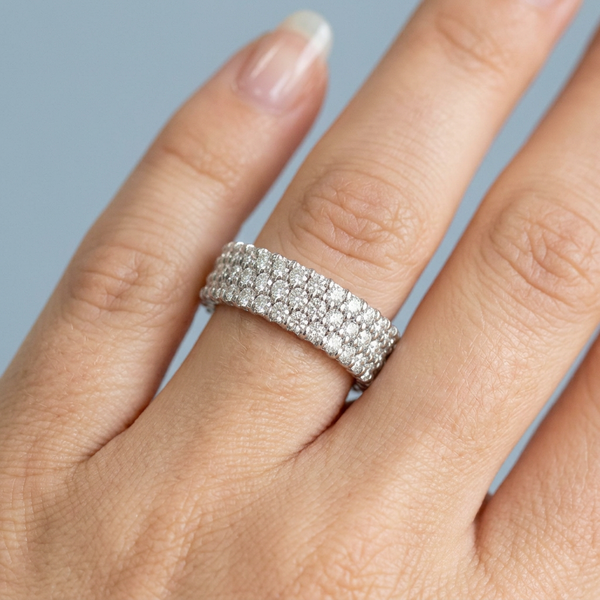 Hand model shot of the white gold diamond wedding band