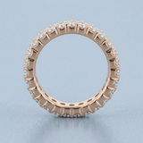 Three row round diamond eternity band