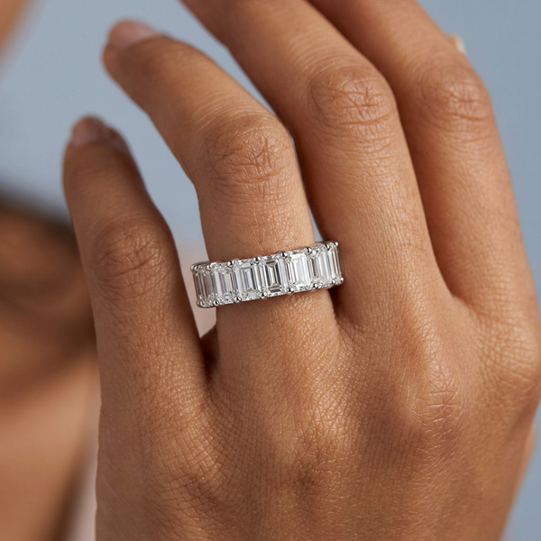 Hand model shot of the white gold Single French Cut Pave diamond wedding band