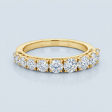 Round brilliant cut asymmetrical wedding band