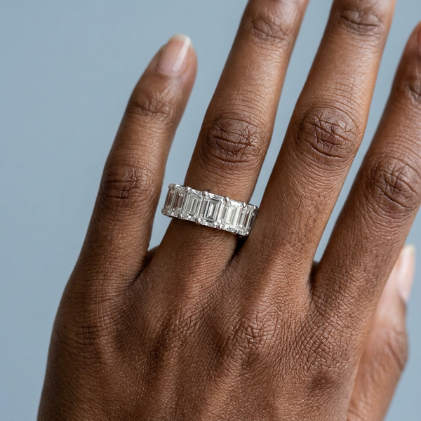 Hand model shot of the white gold Single French Cut Pave diamond wedding band