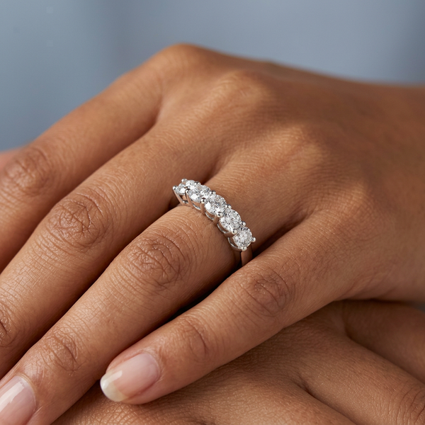 Hand model shot of the white gold diamond wedding band