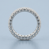 Three row round diamond eternity band