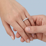 Round brilliant cut asymmetrical wedding band