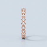 Round diamond bezel set wedding band