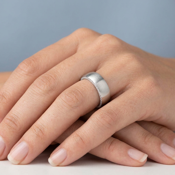 Hand model shot of the white gold Single French Cut Pave diamond wedding band