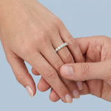 Round brilliant cut asymmetrical wedding band