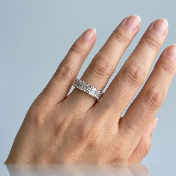 Hand model shot of the white gold diamond wedding band