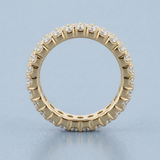 Three row round diamond eternity band