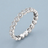 Round diamond bezel set wedding band