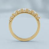 Round brilliant cut asymmetrical wedding band