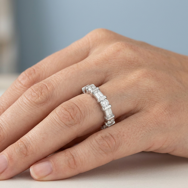 Hand model shot of the white gold diamond wedding band