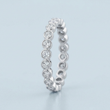 Round diamond bezel set wedding band