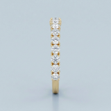 Round brilliant cut asymmetrical wedding band