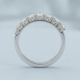 Round brilliant cut asymmetrical wedding band