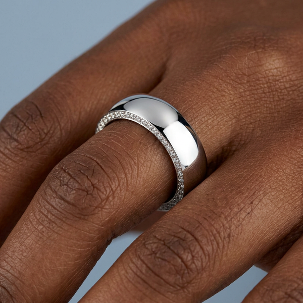 Hand model shot of the white gold Single French Cut Pave diamond wedding band