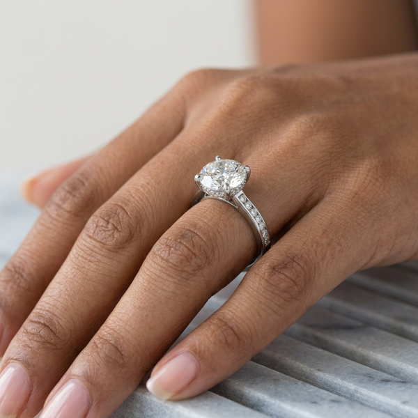 Hand model shot of the white gold engagement ring