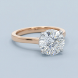 Round Brilliant Two-Tone Solitaire with Diamond Bridge & Hidden Halo