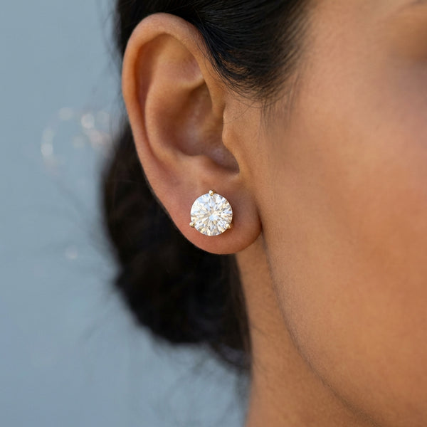 Model shot of the yellow gold earrings