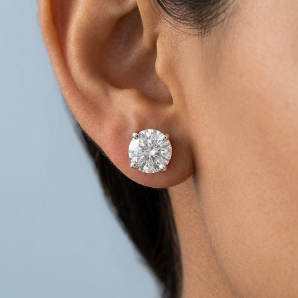 Model shot of the white gold earrings