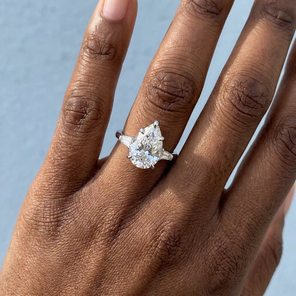 Hand model shot of the white gold engagement ring