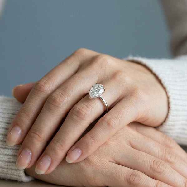 Hand model shot of the white gold engagement ring