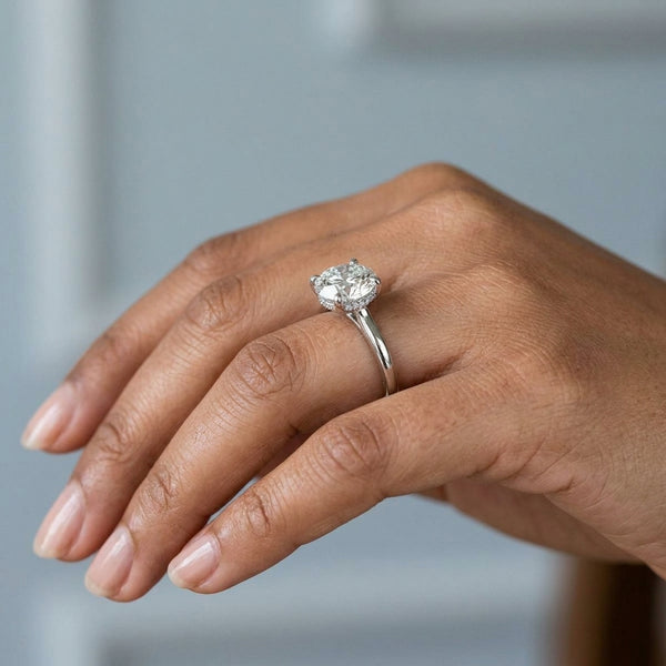 Hand model shot of the white gold engagement ring