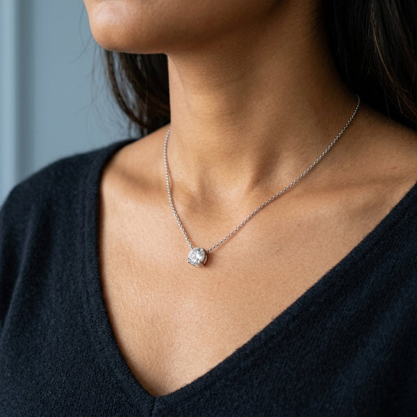 Neck model shot of the white gold necklace