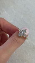 Marquise cut Three Stone Engagement Ring