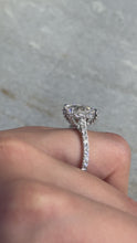 Oval Cut Diamond Ring with Pave Band and Hidden Halo