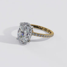 Two-Tone Oval cut Diamond and Hidden Halo Ring