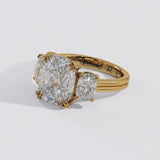 Three stone cushion cut diamond engagement ring