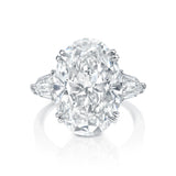 Three stone oval cut diamond engagement ring