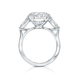 Three stone oval cut diamond engagement ring