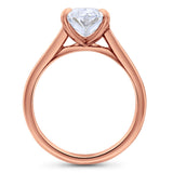 Clean Lines Oval Diamond Solitaire, with Rubies Inside.