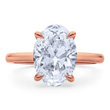 Clean Lines Oval Diamond Solitaire, with Rubies Inside.