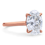 Clean Lines Oval Diamond Solitaire, with Rubies Inside.