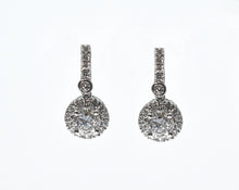 1.30 + carat Ideal Cut Round Brilliant Cut Lab Grown Diamond Earrings, set in the halo.